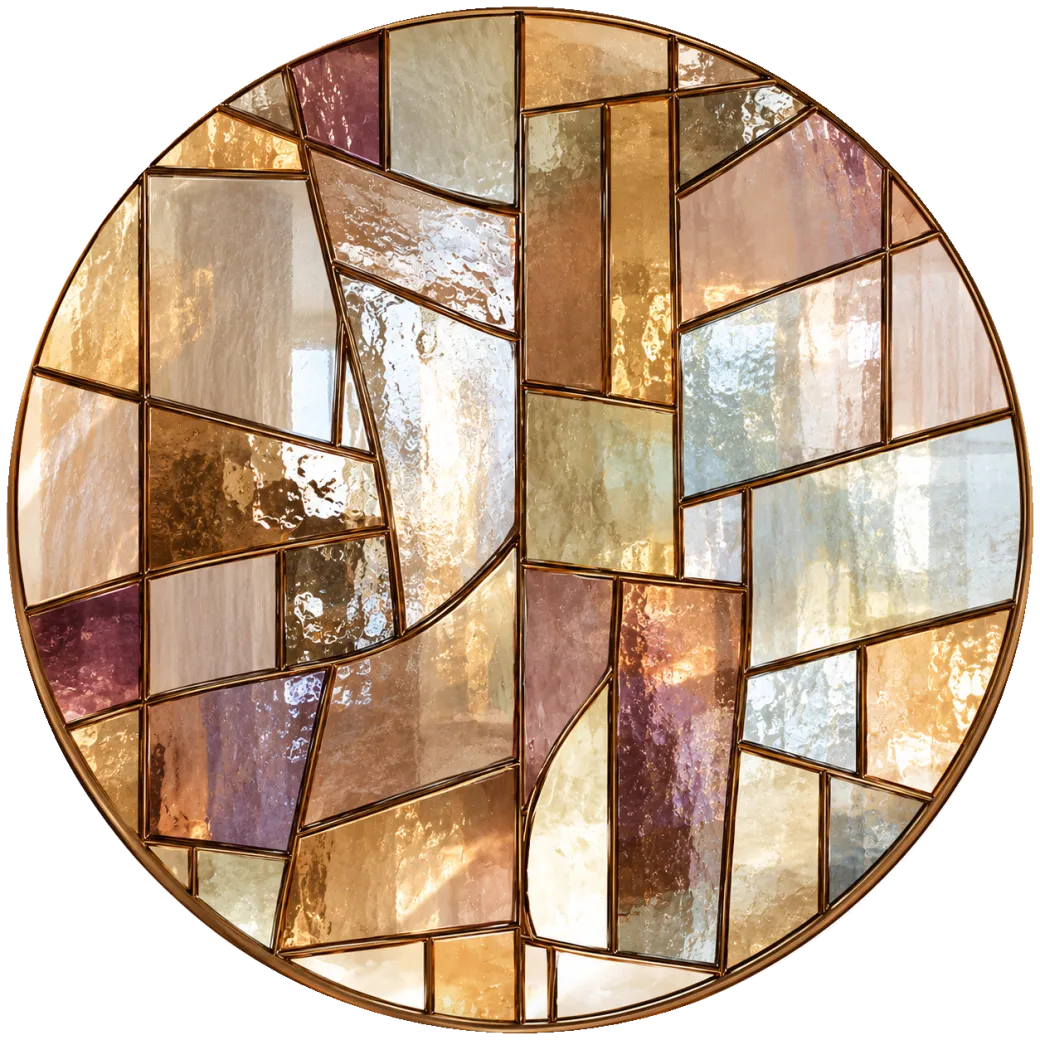 A round stained-glass window in warm fig, amber and clear glass